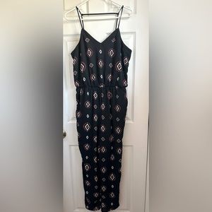 Women’s size Medium jumpsuit. New with tags